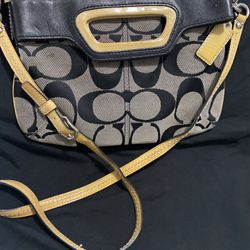 Long yellow And Black Coach Bag
