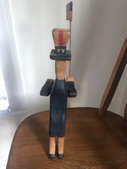 Carved wooden uncle Sam figure