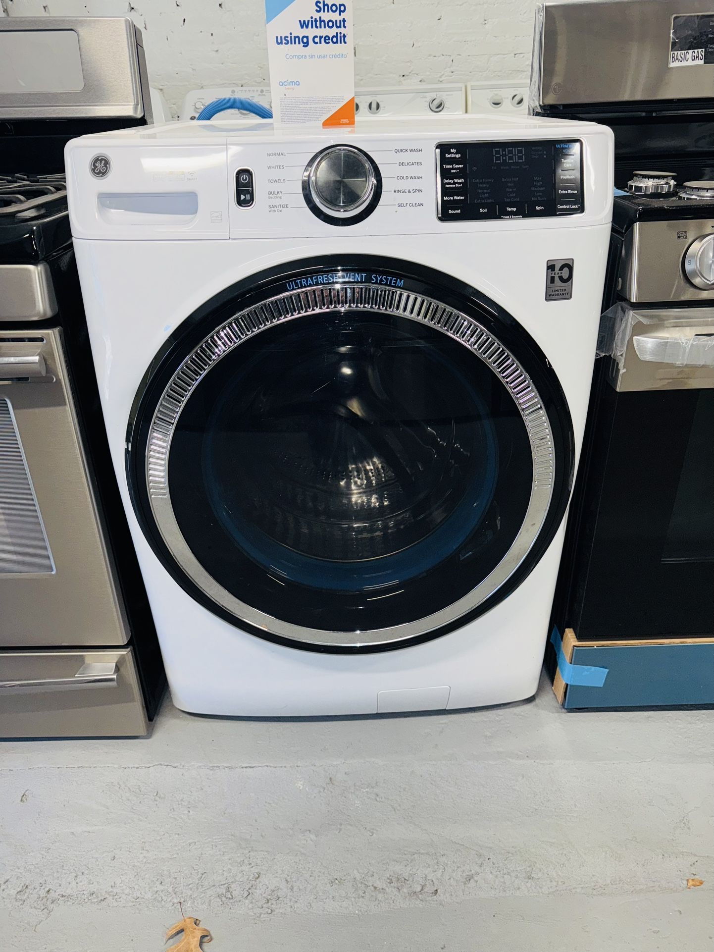 GE washing machine in perfect condition, includes a receipt with a 60-day warranty