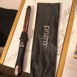 Rotating curling iron