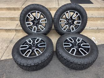 20" CHEVY OEM rims w/ 35" Toyo AT3 tires