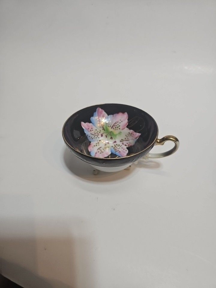 Unmarked footed cup made in Japan Hand Painted black&pink flowers With Gilting