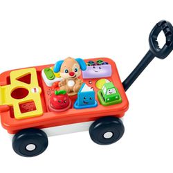 Fisher-Price Baby & Toddler Toy Laugh & Learn Pull & Play Learning Wagon Musical Pull-Along with Activities for Infants Ages 6+ Months​