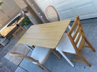 Beautiful IKEA dining table with four chairs solid wood excellent condition H30 W55 D25.  free delivery