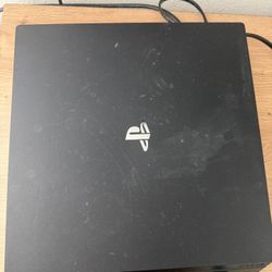 PS4 Pro 1TB with controller and cables