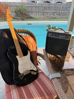 Fender Stratocaster Electric Guitar with Gig Bag and Amp