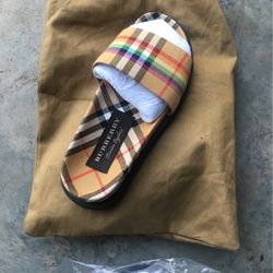 Burberry  Slides  9  &  10 