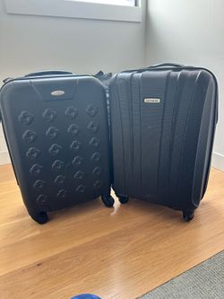Samsonite 21” hard side expandable spinner suitcases