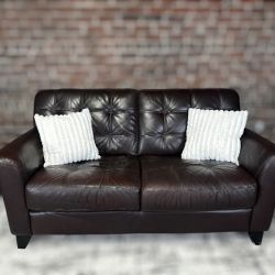 Delivery Available Maceys leather tufted brown loveseat