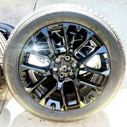 22" GMC Yukon Denali OEM Gloss Black Wheels and Bridgestone Tires w/ Chevy Caps 100% Tread
