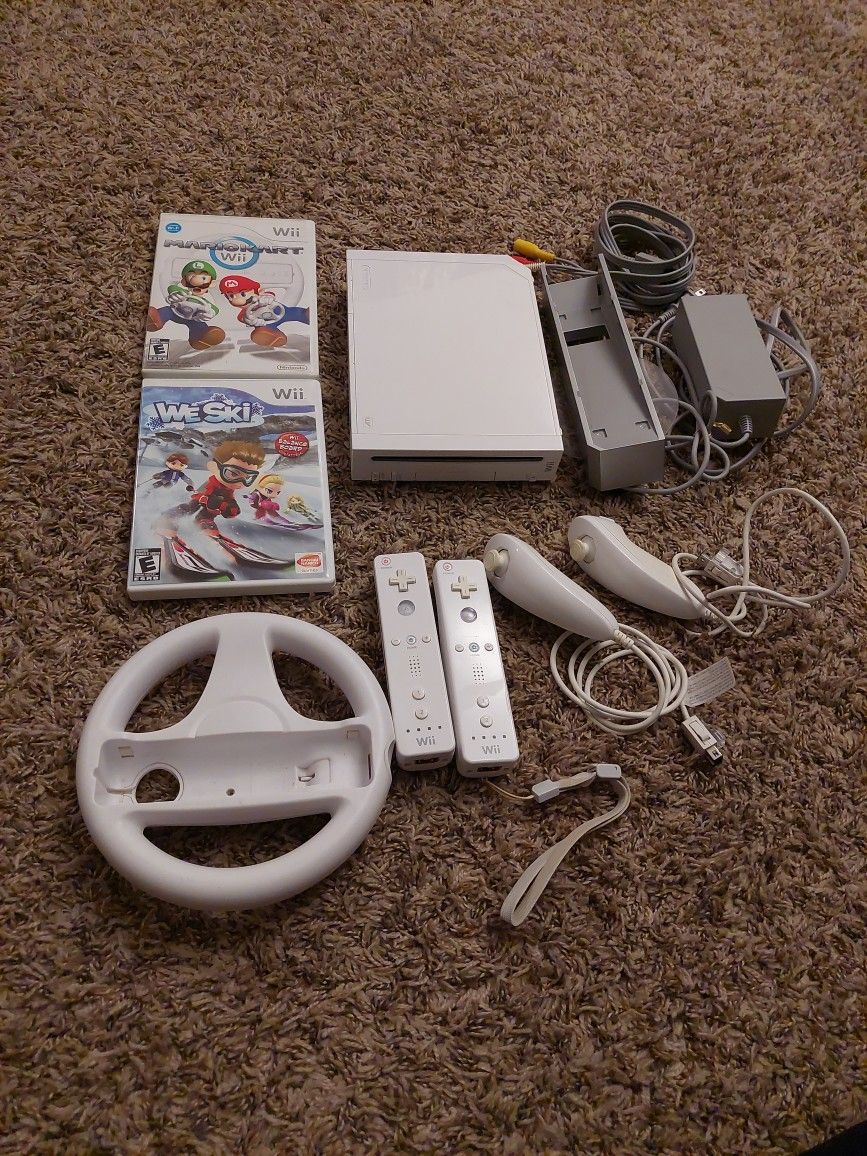 Nintendo Wii With Mario Kart And We Ski Games