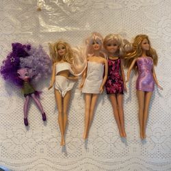 4 Barbies Dolls Plus One