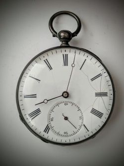 Old antique Victorian key wind Swiss European pocket watch. Late 1800s 4 rubis / jewels. Balance wheel likely not working. Some cracks on dial face bu