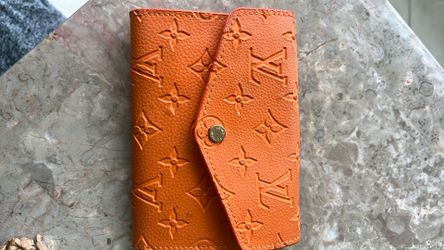 Orange LV embossed wallet