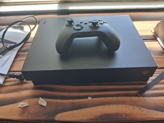 Xbox X with controller and powercord