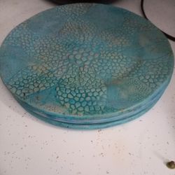 Three handmade high fired stoneware plates.