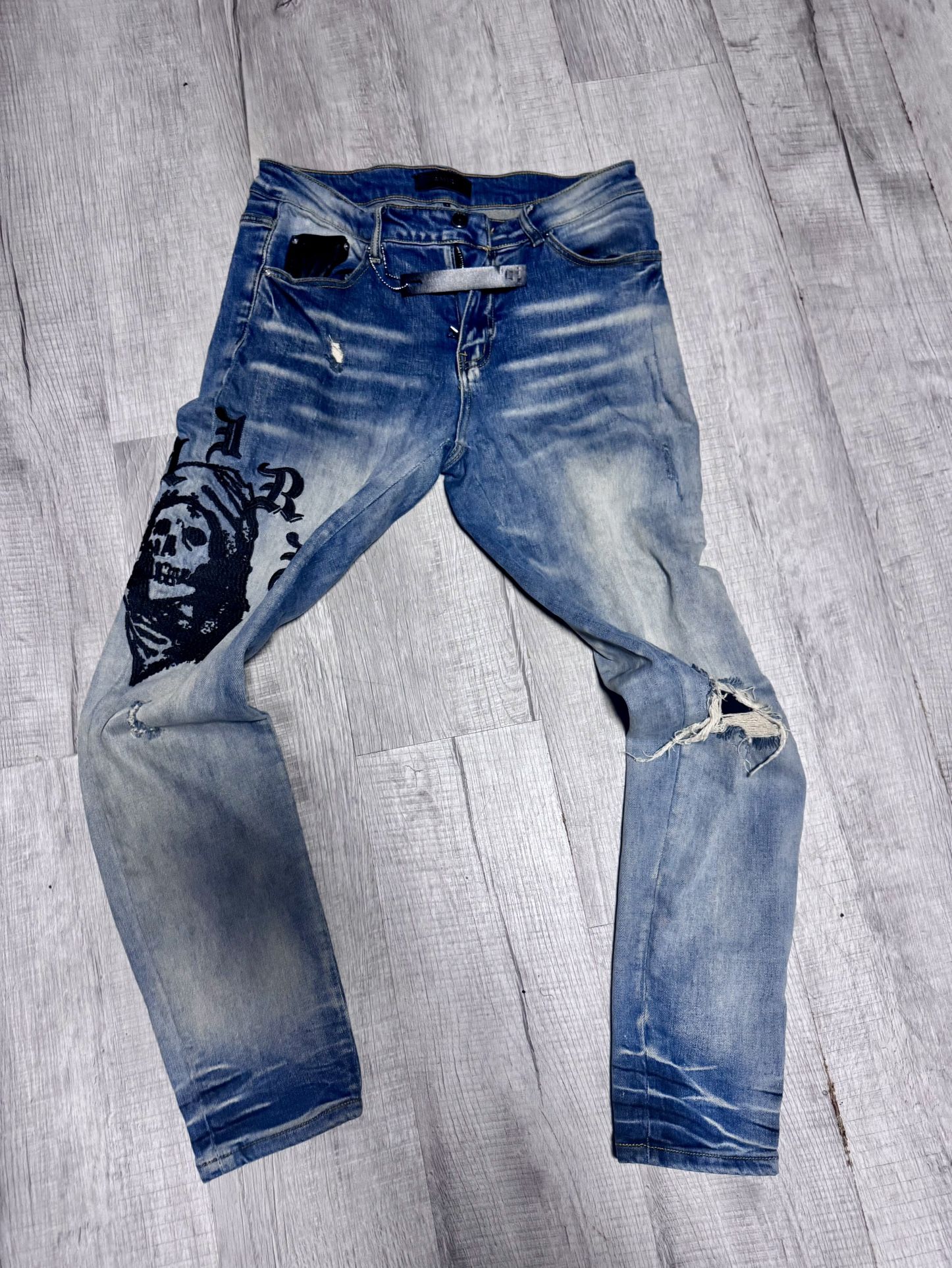 Amiri X WES LANG REAPER LOGO