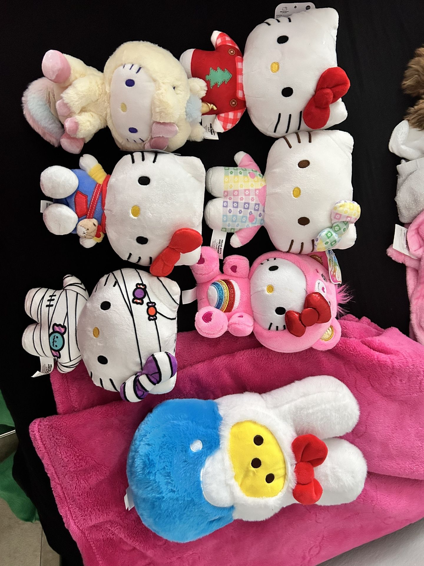 7 Hello Kitty Plushies