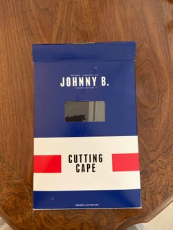 Jonny B cutting cape