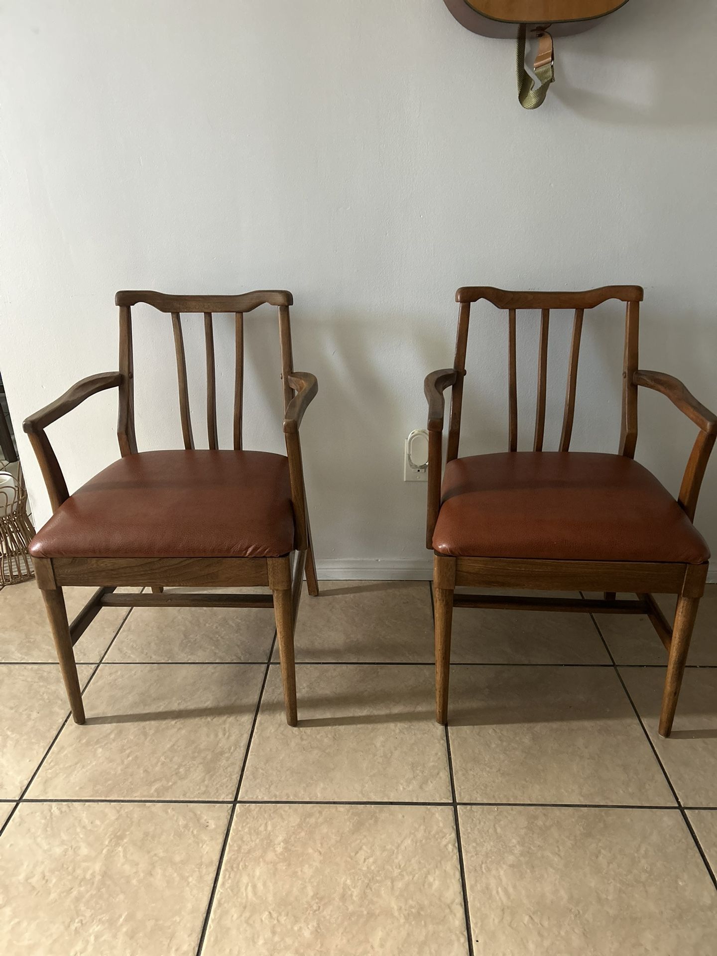 Two Wooden Padded Chairs