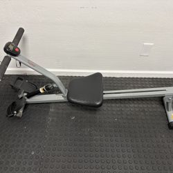 Sunny Health & Fitness Compact Adjustable Rowing Machine with 12 Levels of Resistance for Complete Body Workouts