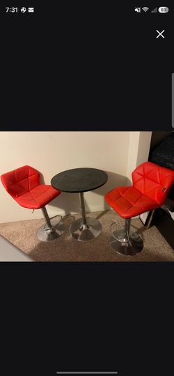 Bar table and red stools