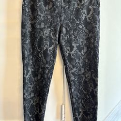 From Anthropologie - Size Small Black Animal Print Leggings 
