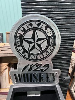 Metal Texas Ranger whiskey bar sign