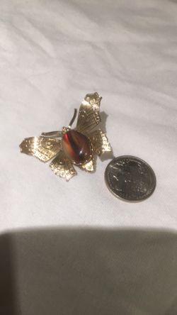 Gold butterfly pin