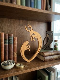 Handcrafted wooden silhouette featuring a deer and a howling wo 9x5 in