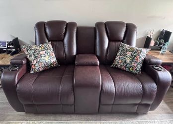 Brown love seat automatic recliner