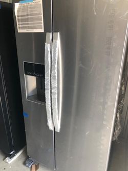 Brand new out the box side by side whirlpool fridge
