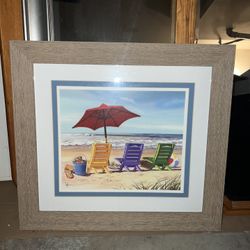 medium framed picture of illustrated beach chairs 