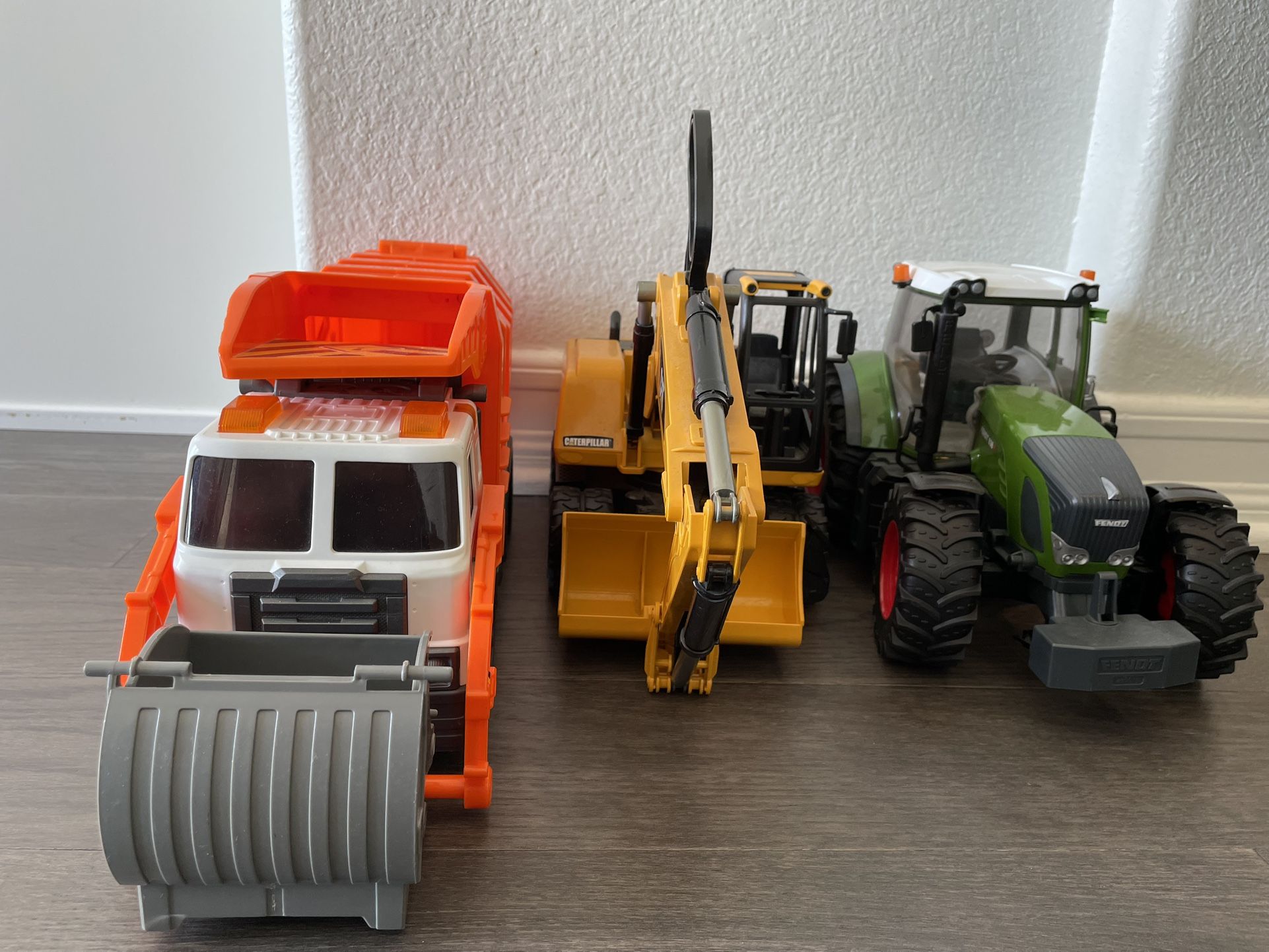 Toys — CAT Excavator, Trash Truck, Bruder Tractor
