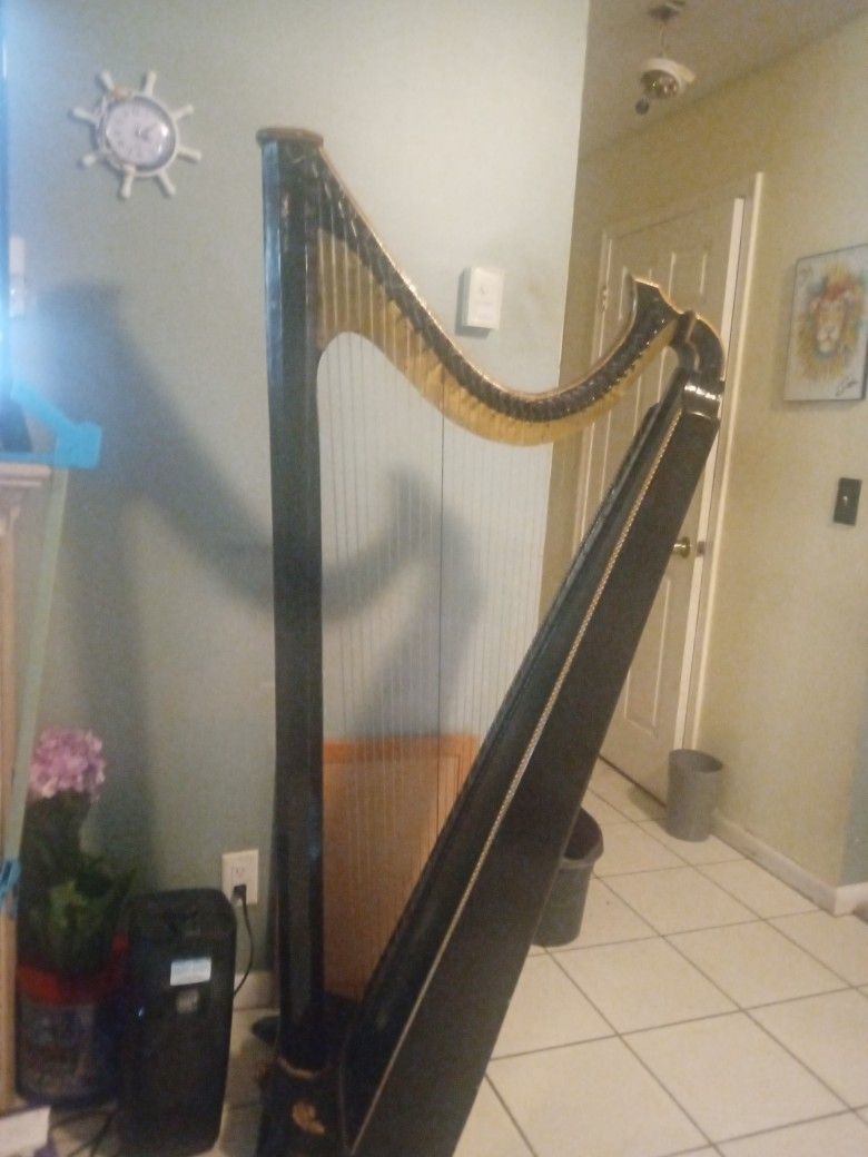 Full Size Harp 72in Tall. Needs A Couple Of Strings But A Great Instrument