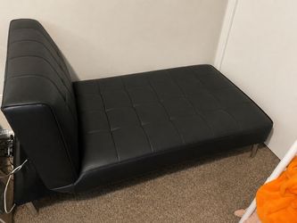 Black chaise lounge