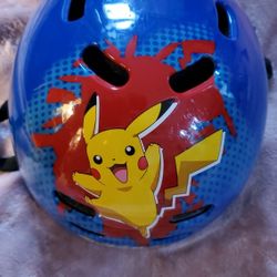 Pokémon bike helmet  kids helmet  51-54 CM , Approx  8" wide x 10" long from front to back..with cushion inside  adjust tightness  still has life