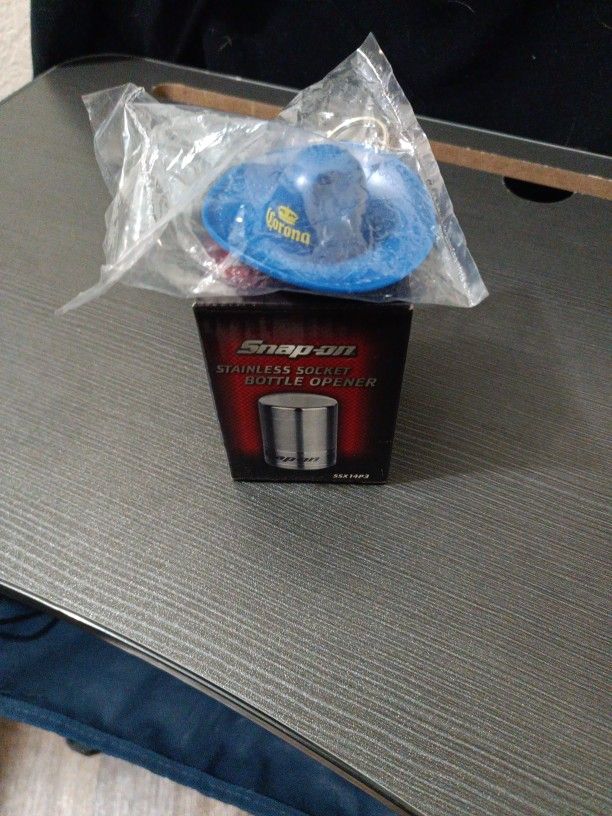 2 bottle cap openers. snap on and Corona