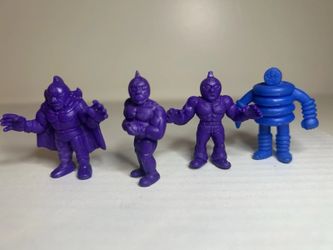 Lot of 4 M.U.S.C.L.E. Men miniature (3 Purple, 1 Blue)