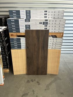 Style Selections Tudor Oak 12-mil Waterproof Luxury Vinyl Flooring