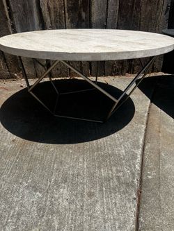 Round stone top coffee table