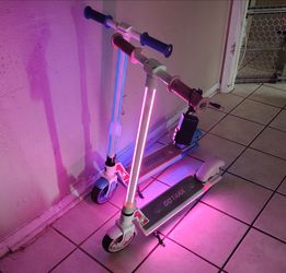 2-Used Go Trax GT-  GKS PLUS Scooters blue and pink (ONLY 1 Charger)