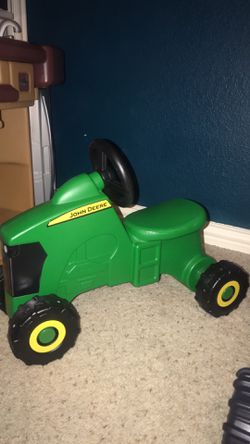John Deere sit and scoot tractor toy
