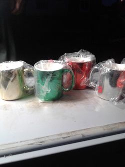 Four Metallic Coffee Cups