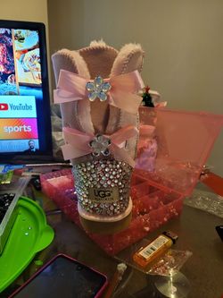 Custom ugg boots hit me up...sizes 5, 8,9,and 10...dark purple, light pink, light purple, hot pink and red