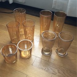 Lot of 16 Peach Orange Vintage Glasses Cups 3 tallest 6 1/2” 1 goblet 6” 9 middle 5” 1 flowered 4” 2 smallest 3”