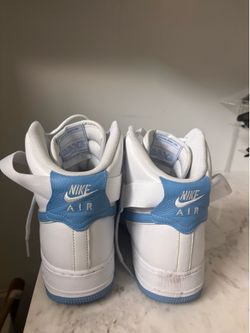 Nike Air Force size 10 US 1 Highs in white and light blue.