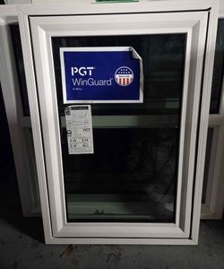 Brand New 25W x 37H PGT Impact Casement Window.