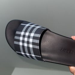 Black Burberry slides