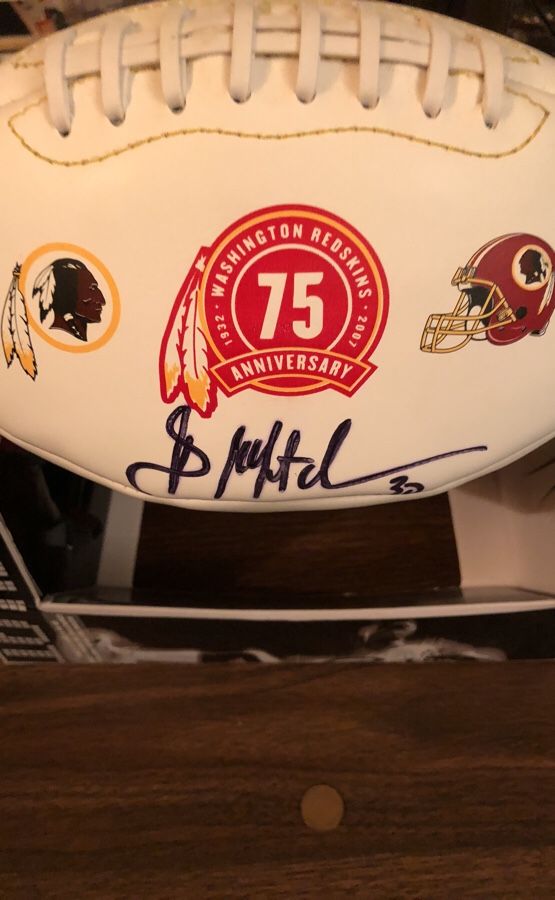 Autographed Washington Redskin Football by Redskins All Time All Purpose Yards Leader Brian Mitchell! Autograph in Black Sharpie!